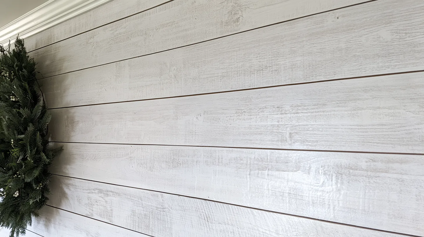 Textured white wall with subtle grain pattern, providing a clean and professional backdrop for video calls.